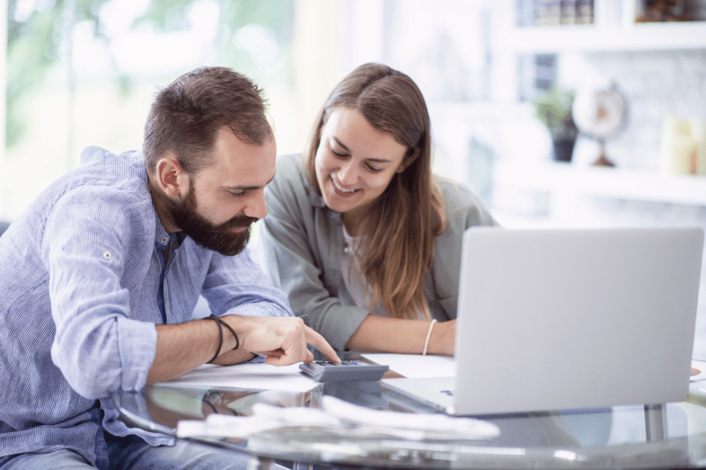 couple working on their financial goals together