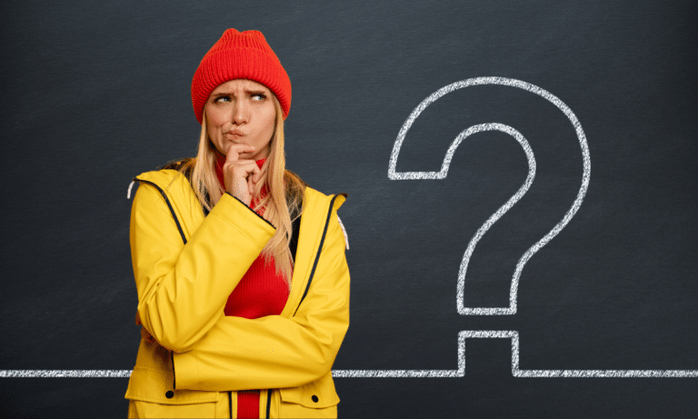 woman in bright outfit thinking about question to ask